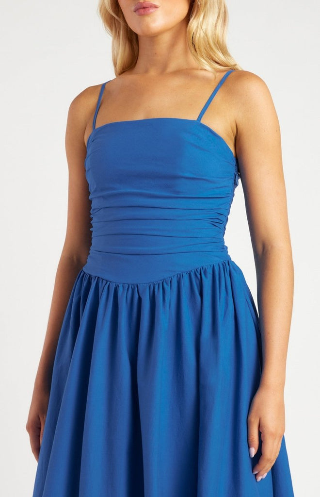 Royal Blue Midi Dress with Ruched Bodice – Featuring delicate spaghetti straps, a ruched fitted bodice, and a voluminous bubble hem. This timeless silhouette is perfect for weddings, cocktail parties, or any elegant occasion.