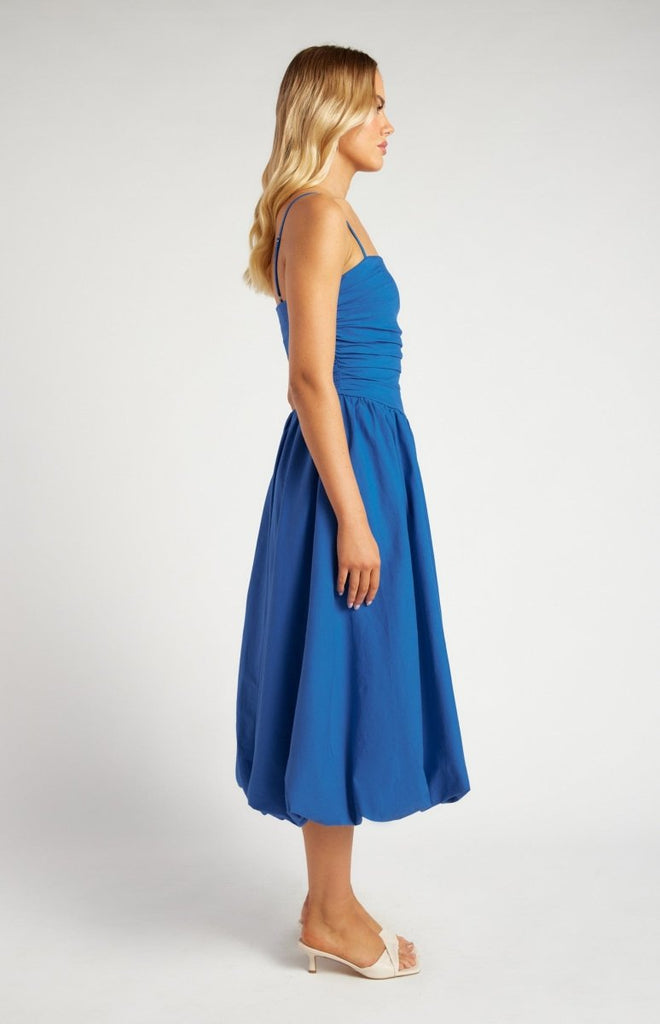 Royal Blue Midi Dress with Ruched Bodice – Featuring delicate spaghetti straps, a ruched fitted bodice, and a voluminous bubble hem. This timeless silhouette is perfect for weddings, cocktail parties, or any elegant occasion.