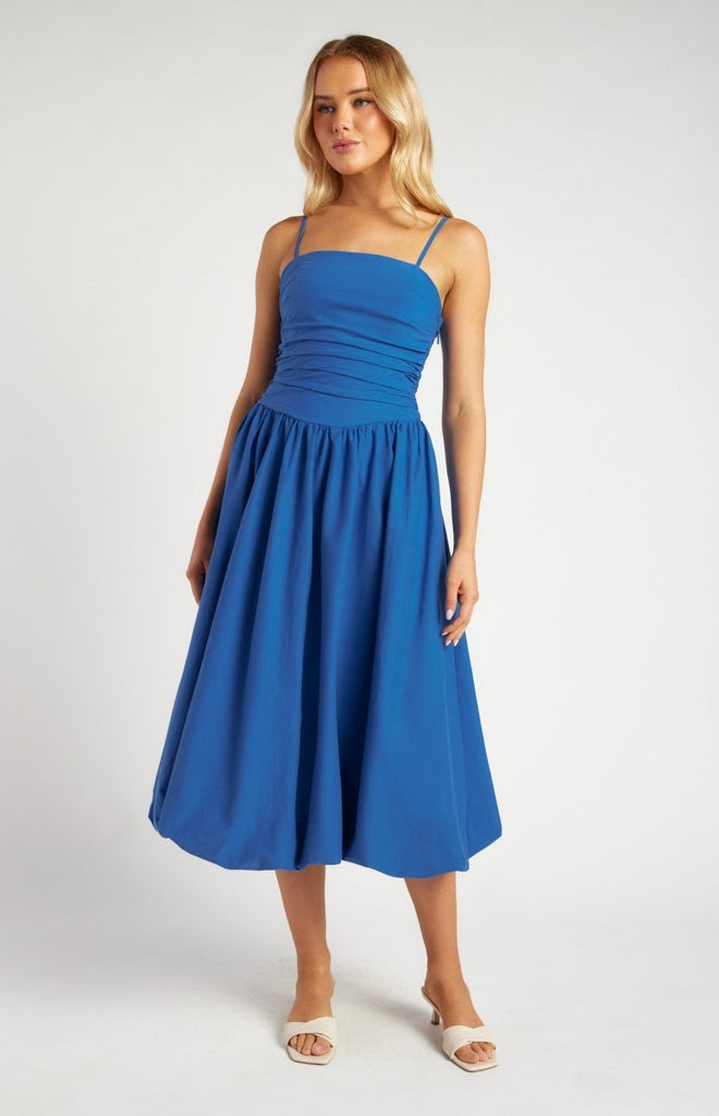 Royal Blue Midi Dress with Ruched Bodice – Featuring delicate spaghetti straps, a ruched fitted bodice, and a voluminous bubble hem. This timeless silhouette is perfect for weddings, cocktail parties, or any elegant occasion.