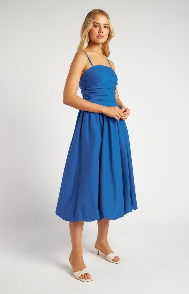 Royal Blue Midi Dress with Ruched Bodice – Featuring delicate spaghetti straps, a ruched fitted bodice, and a voluminous bubble hem. This timeless silhouette is perfect for weddings, cocktail parties, or any elegant occasion.